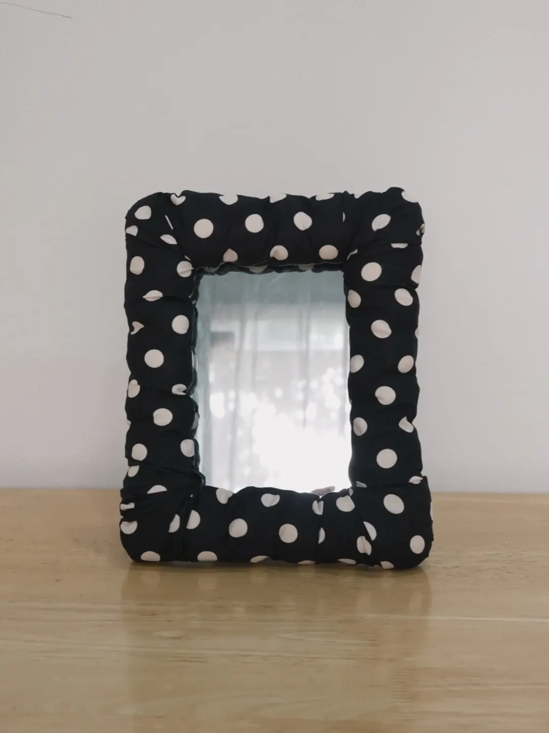 black dot mirror