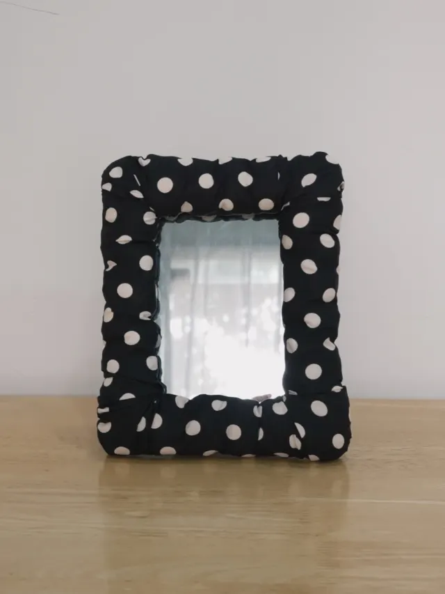black dot mirror