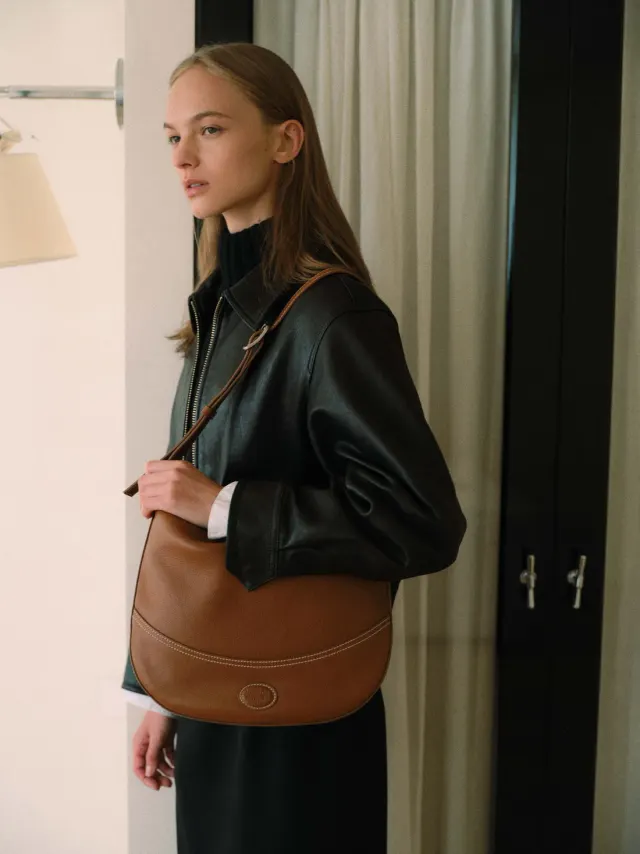 Soft leather half moon book bag Camel